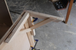 Mounting bracket to couch frame